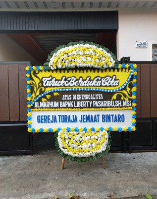 Papan Bunga Duka di Moyo Hulu